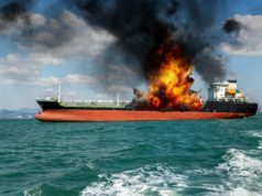 A ship hit by a cruise missile in the Strait of Hormuz